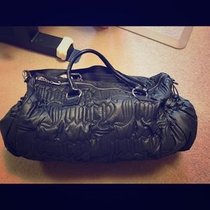 Jucy couture duffel bag and travel bag